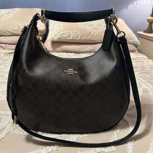 Coach Black and Brown Hobo Bag 
LIKE NEW 
MSRP $459
14H X 10H X 5D